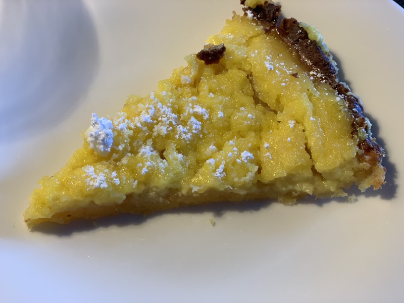 Zitronentarte rezept - ein stueck gebackene Zitronentarte